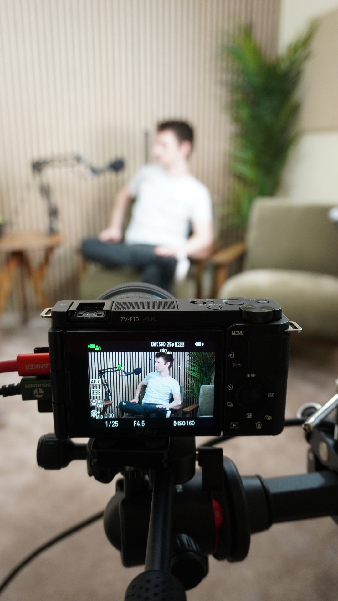 Guest at Churchside podcast viewed through camera viewfinder